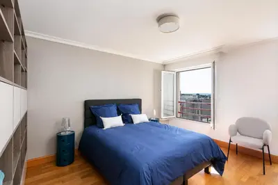 Un ou plusieurs lits dans un hébergement de l'établissement Appart de standing au centre-ville avec Vue Mer Terrasse et Garage