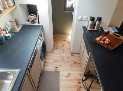 Cuisine ou kitchenette dans l'établissement Moulin du Roz