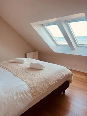 Un ou plusieurs lits dans un hébergement de l'établissement Maisons Bodenn - Villa de Pors Riagat Front de Mer