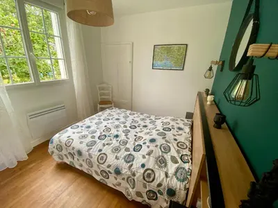 Un ou plusieurs lits dans un hébergement de l'établissement L'Oasis, Maison avec jardin au Cabellou Concarneau