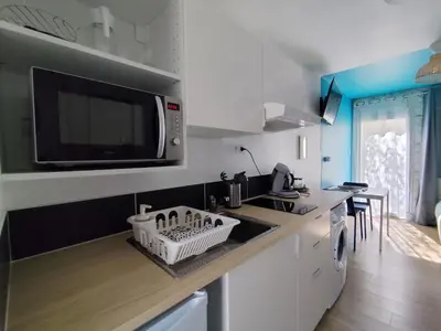Cuisine ou kitchenette dans l'établissement Beau studio en toute intimité proche facultés