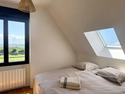 Un ou plusieurs lits dans un hébergement de l'établissement Villa Kermilon sea view and quiet 12p