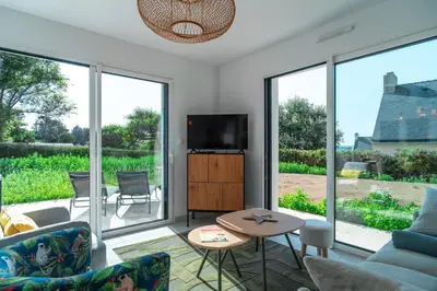 Télévision ou salle de divertissement dans l'établissement Maison HG - Presqu'ile de Crozon