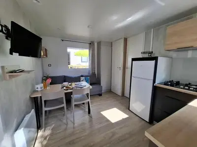 Cuisine ou kitchenette dans l'établissement Camping 4 étoiles - Parc aquatique - ccbbiei
