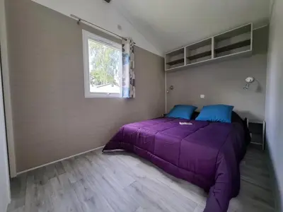 Un ou plusieurs lits dans un hébergement de l'établissement Camping 4 étoiles - Parc aquatique - ccbbiei