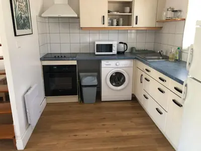 Cuisine ou kitchenette dans l'établissement Cap Cozy Maison près de la mer fouesnant