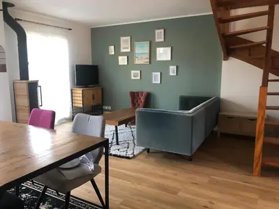 Coin salon dans l'établissement Cap Cozy Maison près de la mer fouesnant