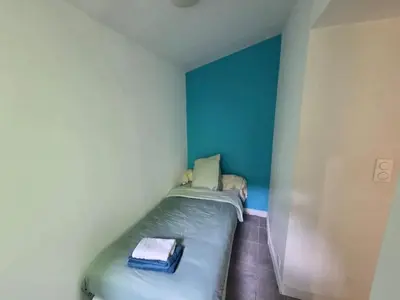 Un ou plusieurs lits dans un hébergement de l'établissement Appartement confortable à Brest, 40 m² avec 2 chambres