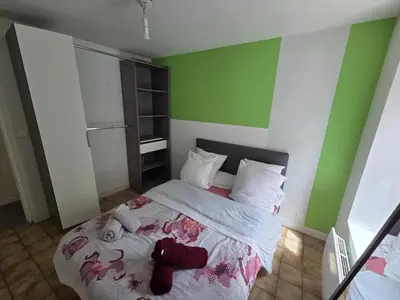 Un ou plusieurs lits dans un hébergement de l'établissement Appartement confortable à Brest, 40 m² avec 2 chambres