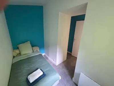 Un ou plusieurs lits dans un hébergement de l'établissement Appartement confortable à Brest, 40 m² avec 2 chambres