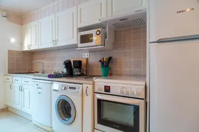 Cuisine ou kitchenette dans l'établissement Le Trèfle à 4 feuilles - Presqu'ile de Crozon