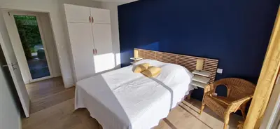 Un ou plusieurs lits dans un hébergement de l'établissement Le Garros - Maison familiale calme 300m des plages