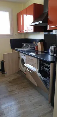 Cuisine ou kitchenette dans l'établissement A 2 pas des iles