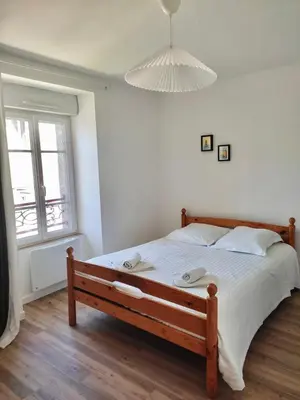 Un ou plusieurs lits dans un hébergement de l'établissement Appartement 1 chambre Centre Ville