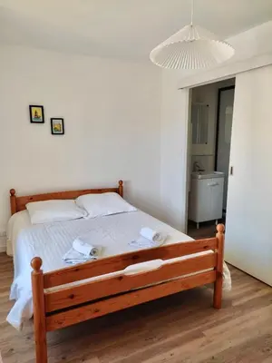 Un ou plusieurs lits dans un hébergement de l'établissement Appartement 1 chambre Centre Ville
