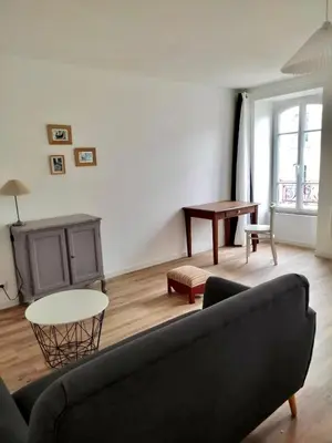 Coin salon dans l'établissement Appartement 1 chambre Centre Ville