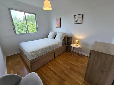 Un ou plusieurs lits dans un hébergement de l'établissement Appartement des Rives de la Penfeld