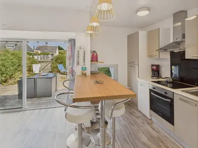 Cuisine ou kitchenette dans l'établissement 200m plage - duplex pour 2 adultes, 2 enfants