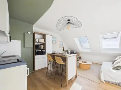 Cuisine ou kitchenette dans l'établissement L îlot d Arthur