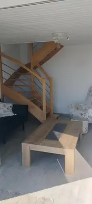 Un ou plusieurs lits superposés dans un hébergement de l'établissement Jolie maison vue sur mer