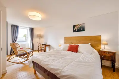 Un ou plusieurs lits dans un hébergement de l'établissement Gîte de vacances pour 6 avec jardin - 800 m plage