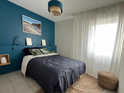 Un ou plusieurs lits dans un hébergement de l'établissement Duplex Lesconil