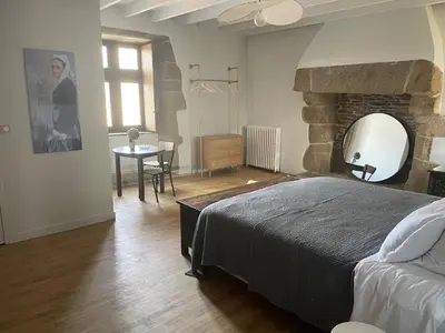 Un ou plusieurs lits dans un hébergement de l'établissement Manoir de Kerenneur