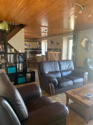 Coin salon dans l'établissement Maison à 440m de la plage