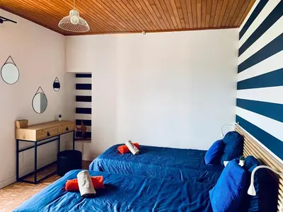 Un ou plusieurs lits dans un hébergement de l'établissement Maison à 440m de la plage