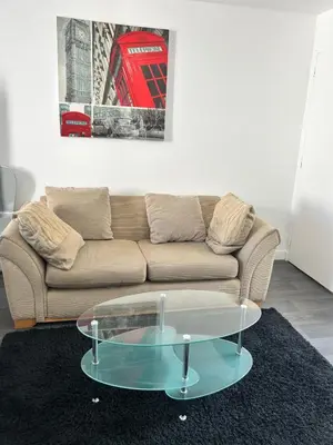Coin salon dans l'établissement Apartment La Fontaine
