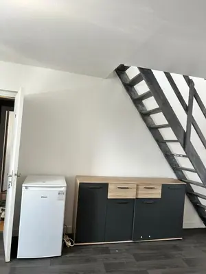 Cuisine ou kitchenette dans l'établissement Le Duplex de la Place
