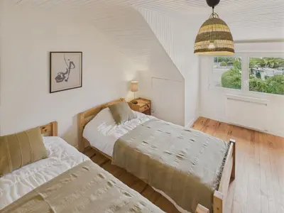 Un ou plusieurs lits dans un hébergement de l'établissement 300m plage - maison pour 7 avec grande terrasse