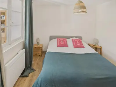 Un ou plusieurs lits dans un hébergement de l'établissement 300m plage - maison pour 7 avec grande terrasse