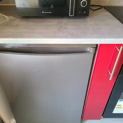 Cuisine ou kitchenette dans l'établissement Appartement Proche du centre