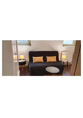 Coin salon dans l'établissement petit studio, Tout équipé, canapé lit