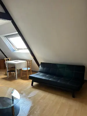 Coin salon dans l'établissement Le Nid Masarde
