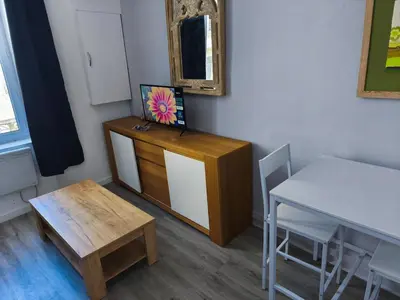 Télévision ou salle de divertissement dans l'établissement Studio Cozy Centre
