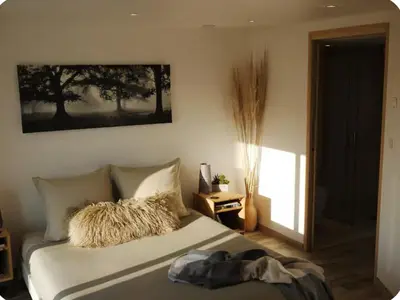Un ou plusieurs lits dans un hébergement de l'établissement Ker Avel - calme- cozy