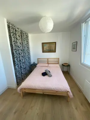 Un ou plusieurs lits dans un hébergement de l'établissement Maison de vacances à pied de la plage du Trez Hir - confort, calme & océan