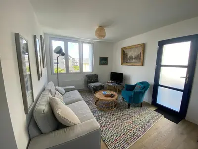 Coin salon dans l'établissement Maison de vacances à pied de la plage du Trez Hir - confort, calme & océan