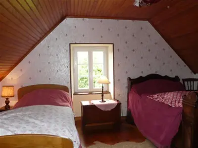 Un ou plusieurs lits dans un hébergement de l'établissement KERVRANT - Maison Bretonne, Bord Mer - AD6008