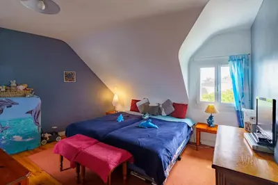 Un ou plusieurs lits dans un hébergement de l'établissement Ty Provans e Breizh - Maison pour 12p