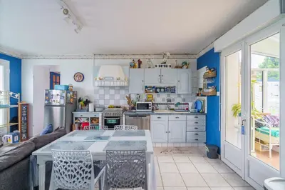 Cuisine ou kitchenette dans l'établissement Ty Provans e Breizh - Maison pour 12p
