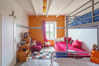 Un ou plusieurs lits dans un hébergement de l'établissement Ty Provans e Breizh - Maison pour 12p
