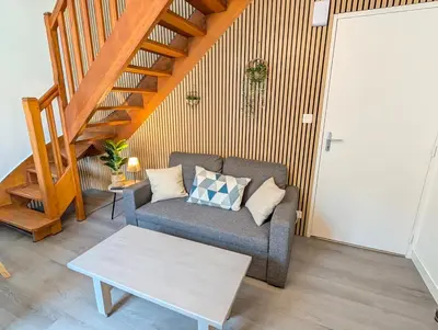 Coin salon dans l'établissement Chaleureux T3 Duplex Centre - 10 min de la gare à pied