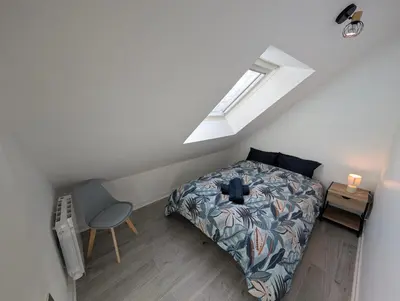 Un ou plusieurs lits dans un hébergement de l'établissement Chaleureux T3 Duplex Centre - 10 min de la gare à pied