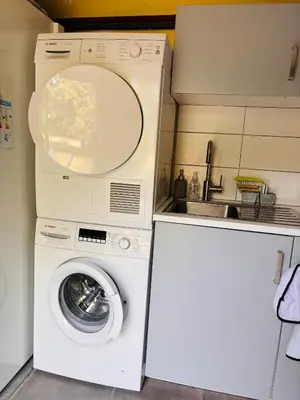 Cuisine ou kitchenette dans l'établissement Maison proche centre Carantec