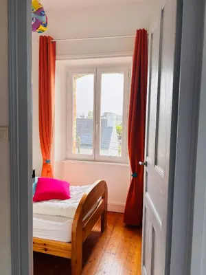 Un ou plusieurs lits dans un hébergement de l'établissement Maison proche centre Carantec
