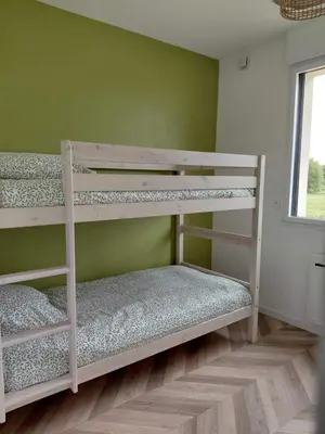 Un ou plusieurs lits dans un hébergement de l'établissement Villa Mahina - 6 chambres - 12 pers