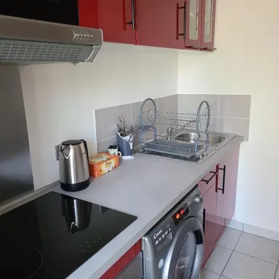 Cuisine ou kitchenette dans l'établissement Appartement BREST st martin